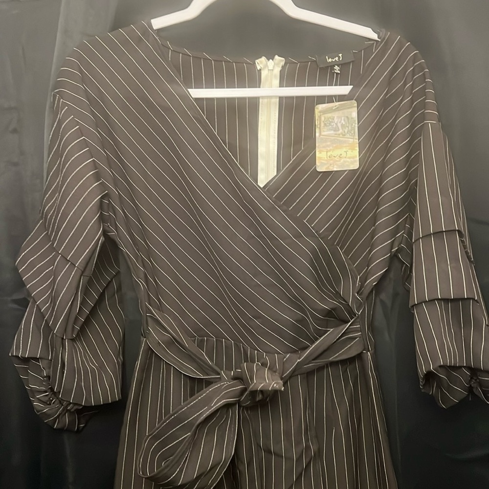 New with tags black with tan pin striped size Med love J romper